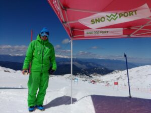 Snowport - trainer - on mountain snow - stand - kolovaris