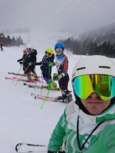 Snowport main race department trainees posing on snow